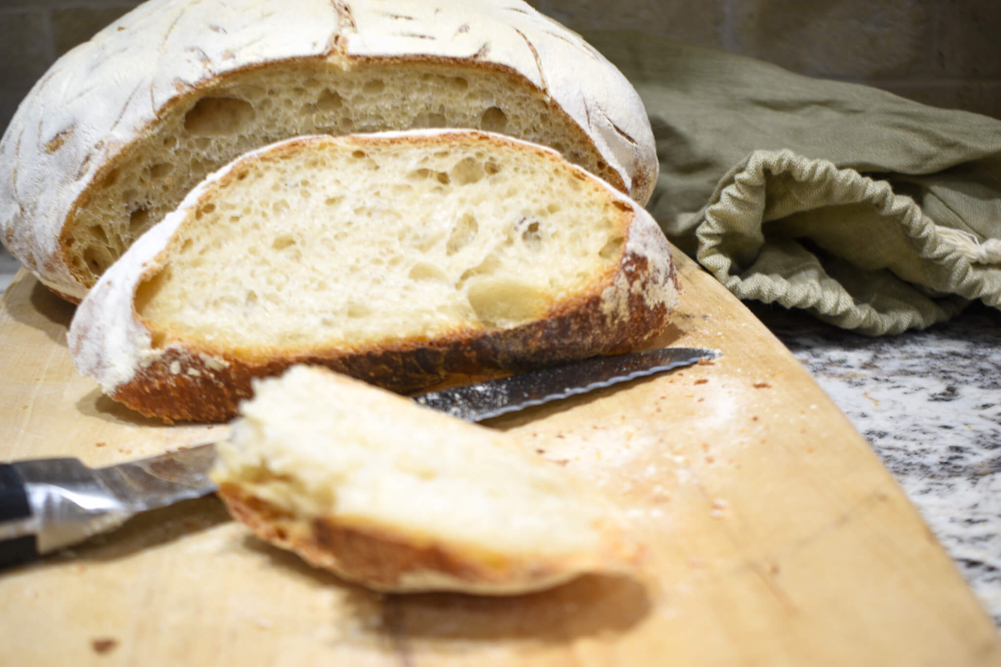 Close up of a crusty whole grain sourdough loaf